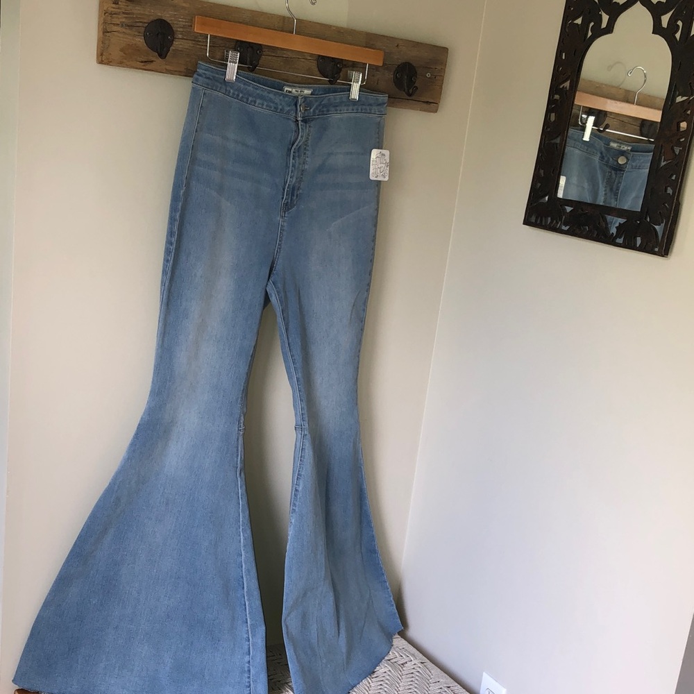 Free People High Rise  Float on Flare jeans.